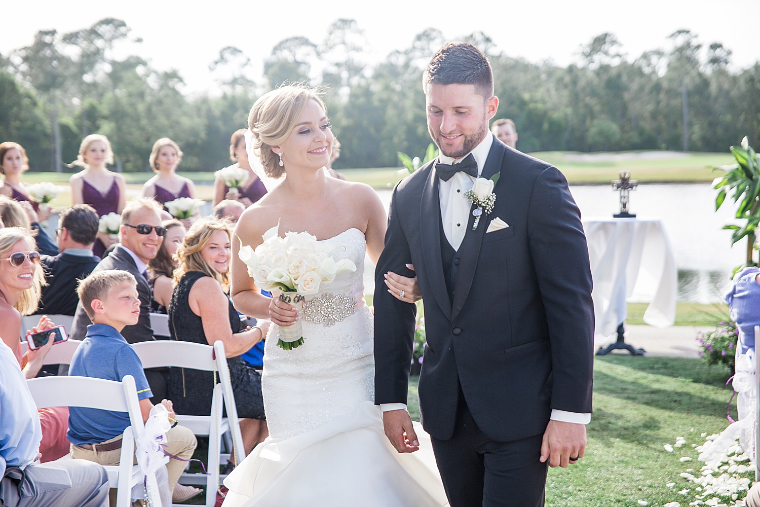 Bride smiles at her groom as they are announced husband and wife